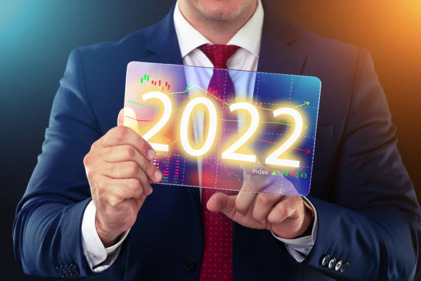 Businessman working with future technology screen, new year 2022 finance and business concept. stock photo