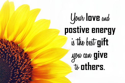 Kindness inspirational quote - Your love and positive energy is the best gift you can give to others. With half sunflower petals on white background. Words of wisdom and positivity concept.