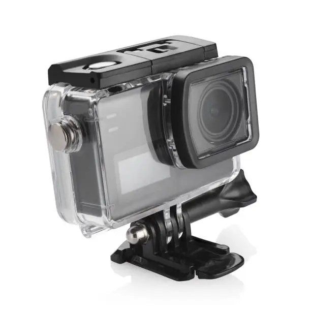 Black small action camera in protection case isolated on white background.