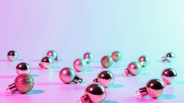 istock Christmas balls neon winter background. Xmas bauble on abstract holiday gradient backdrop. Happy new year copy space. 1356119220