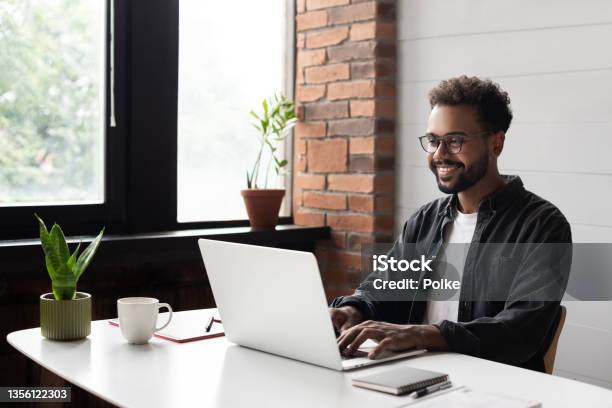 Young Man Working From Home Creative Professional Have Meeting Online Stock Photo - Download Image Now
