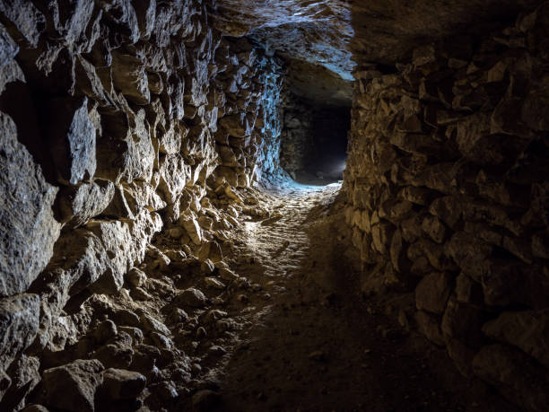 istock A gallery of abandoned limestone mine illuminated by counter light. 1356123882