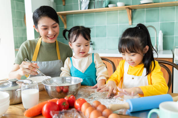 istock Asian mother and daughters 1356124761
