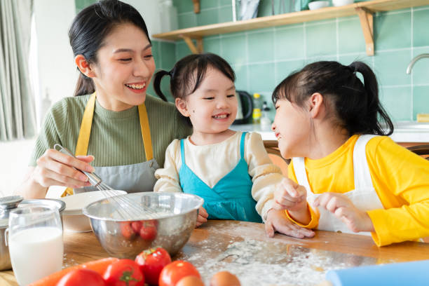 istock Asian mother and daughters 1356124768