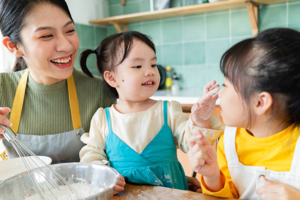 istock Asian mother and daughters 1356124769