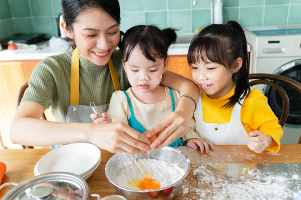 istock Asian mother and daughters 1356124770
