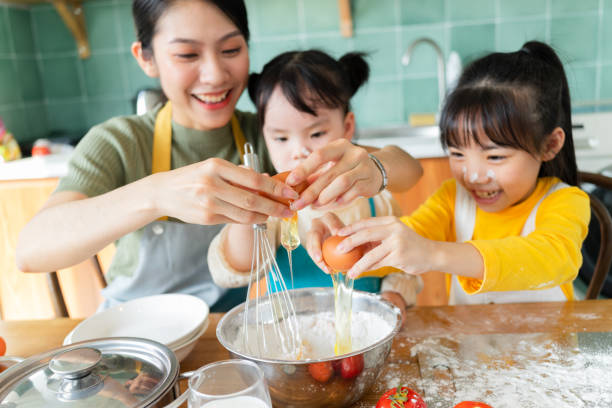istock Asian mother and daughters 1356124774