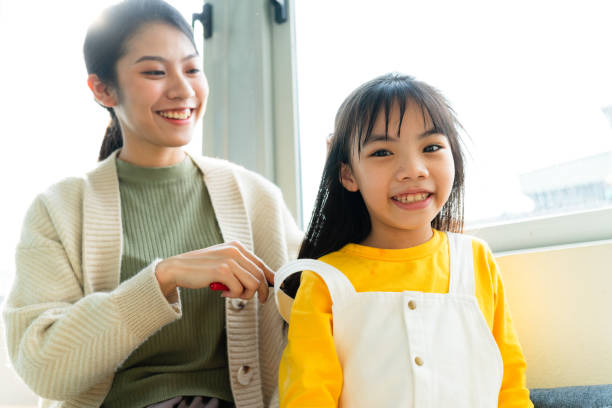 istock Asian mother and daughters 1356124780