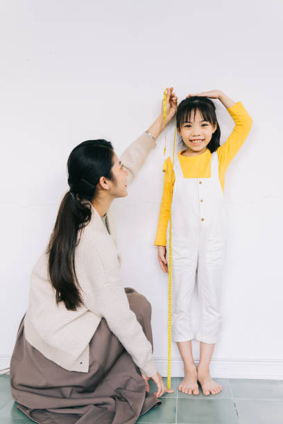 istock Asian mother and daughters 1356124793