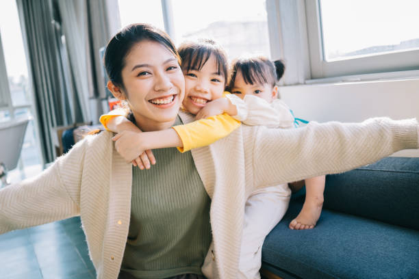 istock Asian mother and daughters 1356124811