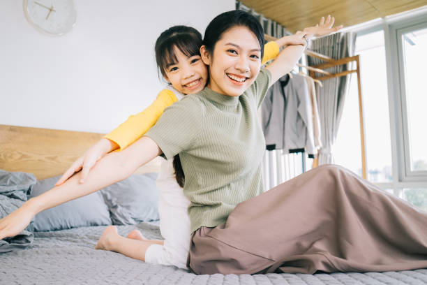 istock Asian mother and daughters 1356124826