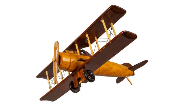 istock Toy wooden airplane isolated on white. 1356130809