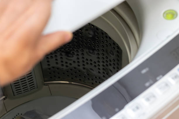 istock Open the lid of the washing machine 1356131328