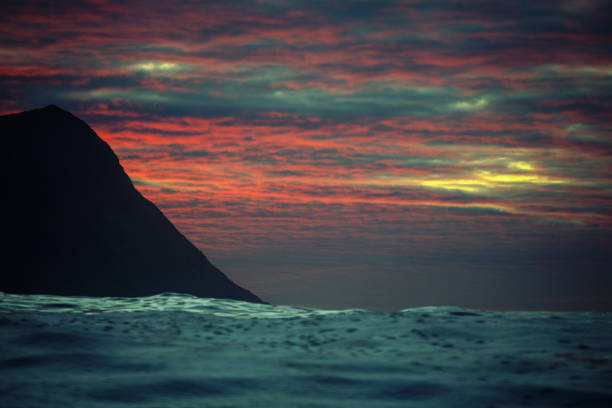 View on a calm sea at sunset, from a boat sailing in open Atlantic ocean