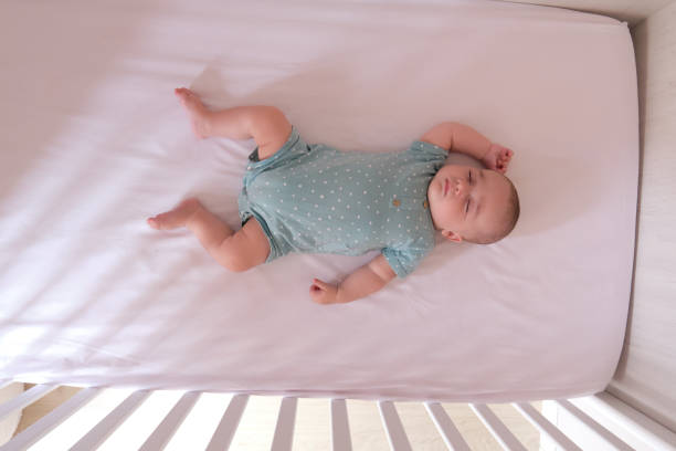 istock Caucasian baby sleeping 1356132423