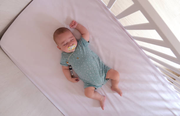 istock Caucasian baby sleeping 1356132424