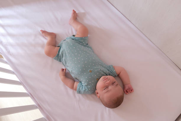 istock Caucasian baby sleeping 1356132458