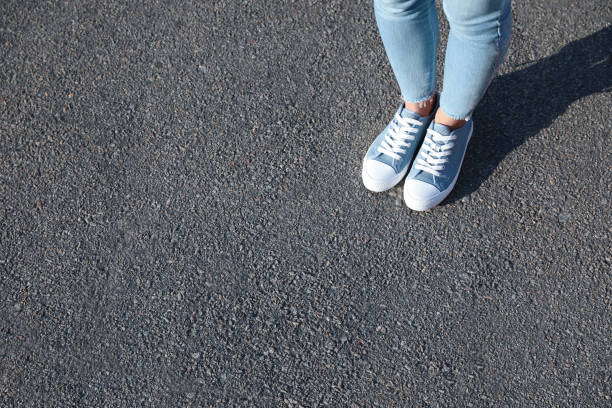Woman standing outdoors, closeup with space for text. Choosing way concept.