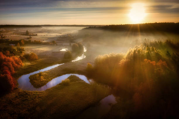 istock Radunia river meanders in the autumnal scenery before sunrise, Kashubia. 1356133912