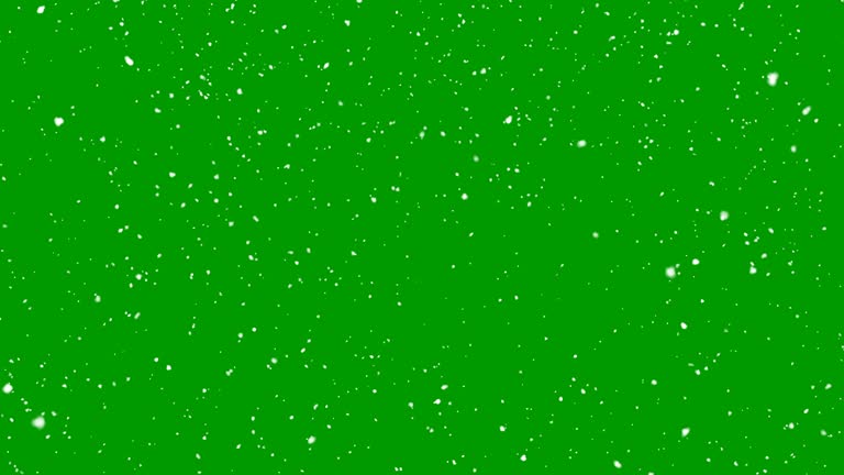 Isolated falling snow on green chroma key background