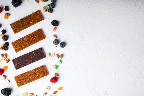 istock Dried fruits bars, top view with copy space, on white background 1356135842