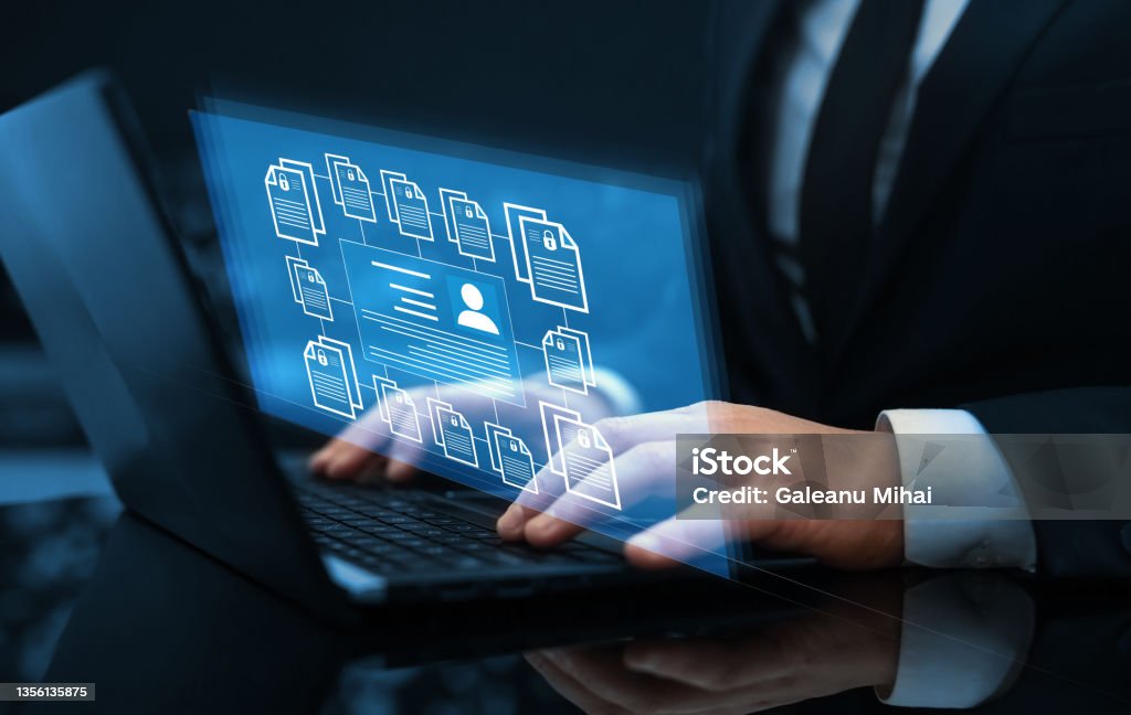 Employee confidentiality. Software for security, searching and managing corporate files and employee information.Corporate data management system and document management system with employee privacy. Employee confidentiality. Software for security, searching and managing corporate files and employee information.Corporate data management system and document management system with employee privacy Computer File Stock Photo
