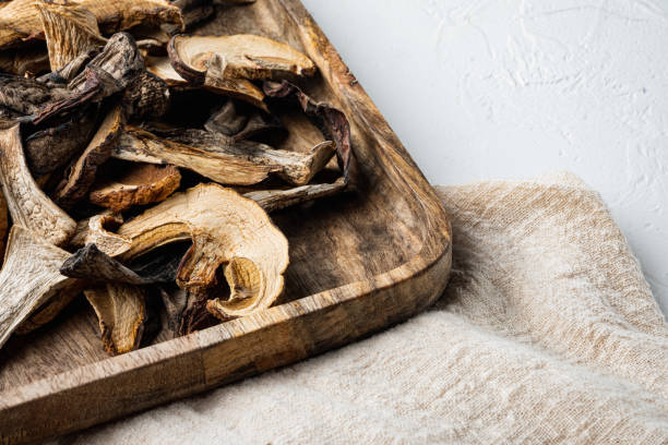 istock Set of dried mushrooms, on white background , with space for text  copyspace 1356135984