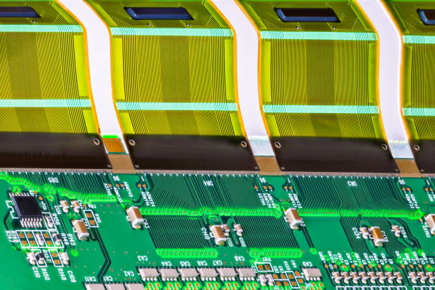 Electronic components on circuit board with printed multi wire connections on bent flexible part
