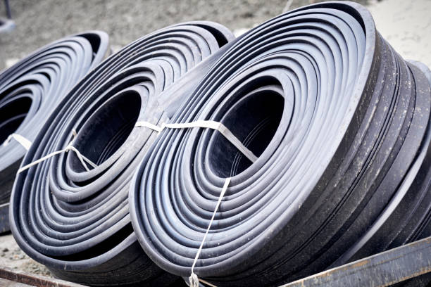 istock Special hoses and pipes on a construction site. 1356137603