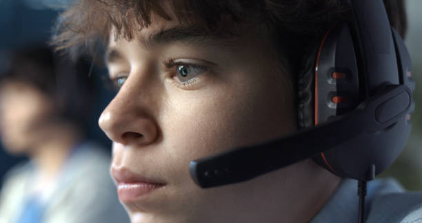 istock Young gamer wearing a headset 1356138861