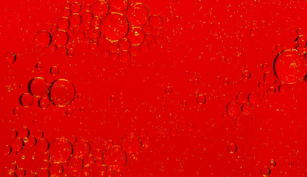 istock red macro bubbles,Backgrounds, Abstract Backgrounds, Soda, Red, Carbonated,Beauty concept background. Closeup cosmetic liquid gel with bubbles on red colors background 1356147639