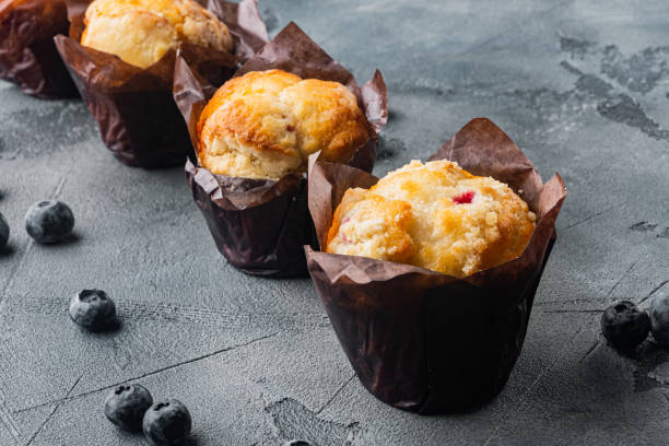 istock Muffin with blueberries, on gray background 1356148277