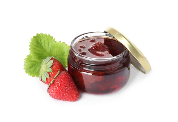 istock Delicious pickled strawberry jam and fresh berries isolated on white 1356149143