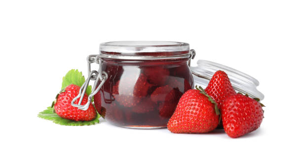 istock Delicious pickled strawberry jam and fresh berries isolated on white 1356149144