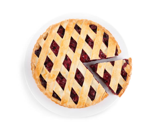 istock Delicious fresh cherry pie isolated on white, top view 1356149233