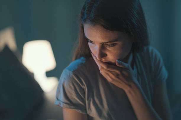 istock Pensive woman unable to sleep 1356149309