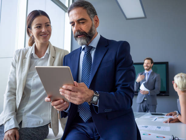 istock Business people working as a team at the office 1356149437
