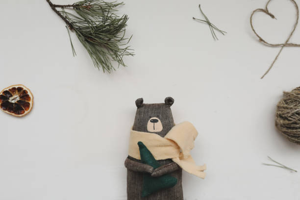 Christmas composition. Toy bear and decorations. Christmas, winter, new year concept. Flat lay, top view, copy space