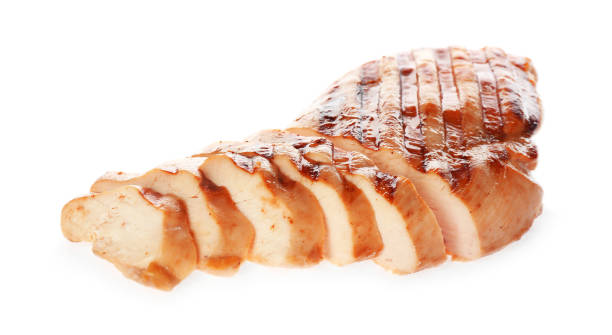 istock Tasty cut grilled chicken fillet isolated on white 1356150141
