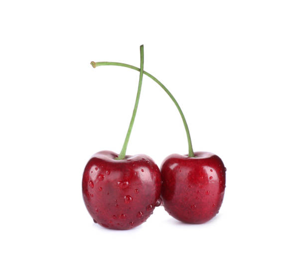 istock Wet ripe sweet cherries isolated on white 1356150249