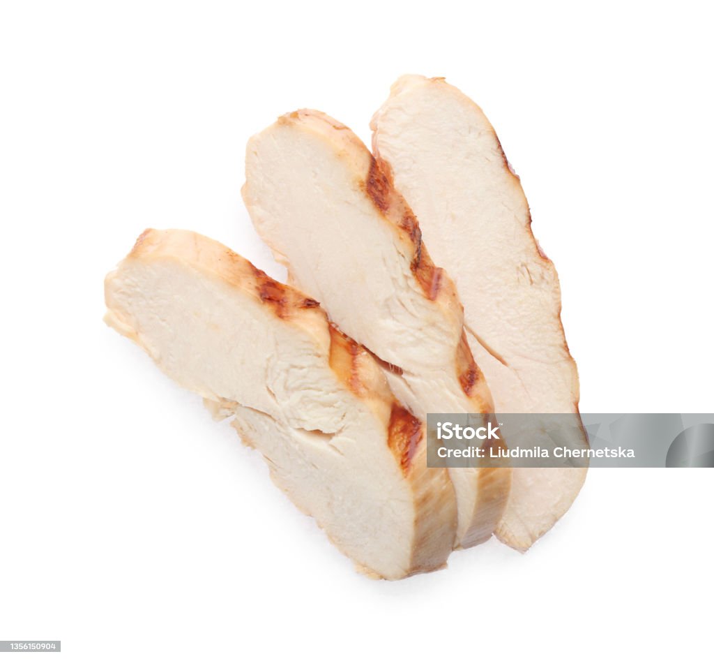 Slices of tasty grilled chicken fillet isolated on white, top view Turkey Meat Stock Photo