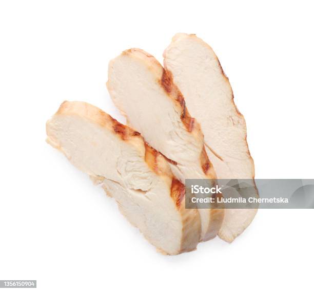 Slices Of Tasty Grilled Chicken Fillet Isolated On White Top View Stock Photo - Download Image Now