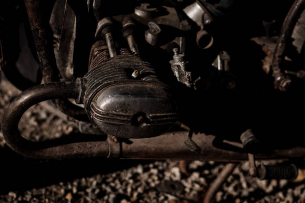 old, rusty motor bike. iron exhaust pipe of a motorcycle. vintage moto