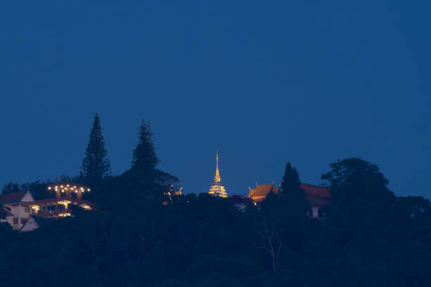 Phra That Doi Suthep Temple at night. Thai architecture temple golden holy shrines light religious, Northern Chiang Mai, Thailand.