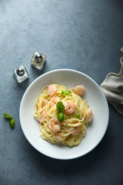 istock Pasta with shrimps 1356153434