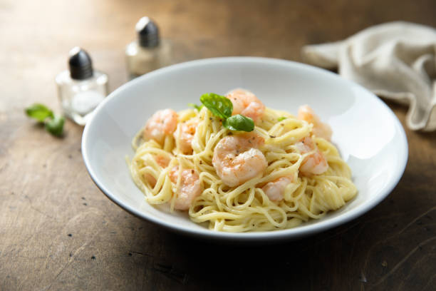 istock Pasta with shrimps 1356153762