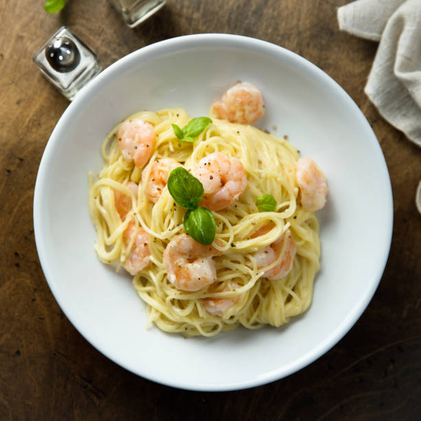 istock Pasta with shrimps 1356154578