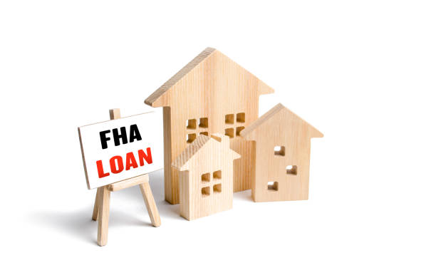 Houses and easel with FHA loan. Mortgage insured by Federal Housing Administration Loan. Affordable loans for borrowers with a low credit score. Down payment. Purchase or refinance a primary residence casas y caballete con préstamo de la fha. hipoteca asegurada por el préstamo de la administración federal de vivienda. préstamos asequibles para prestatarios con un puntaje de crédito bajo. entrada. comprar o refinanciar una residencia principal