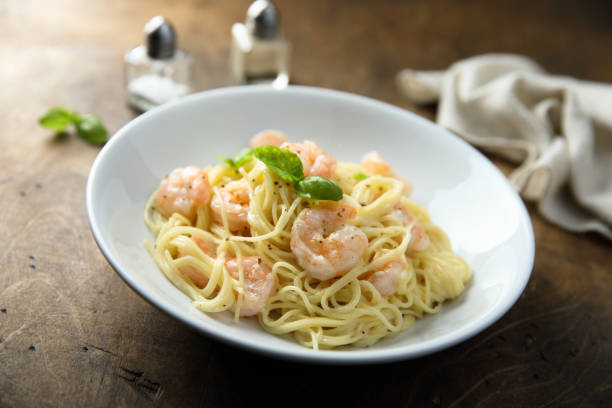 istock Pasta with shrimps 1356156989