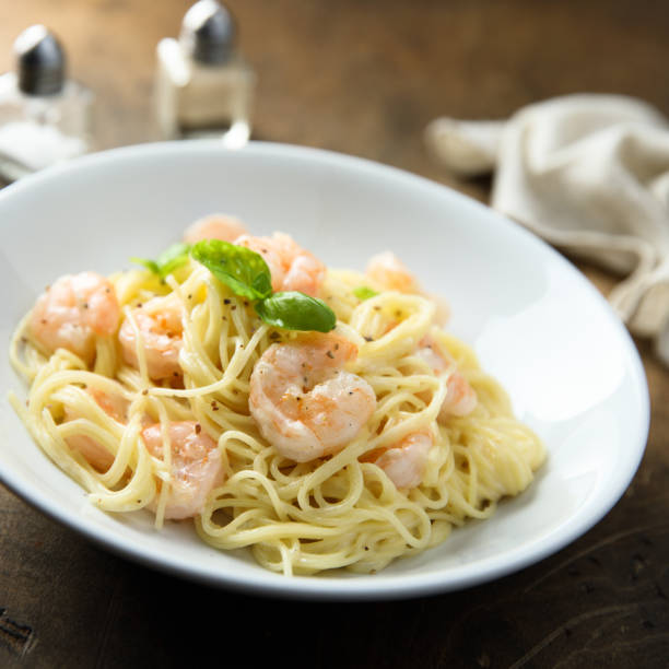 istock Pasta with shrimps 1356157141